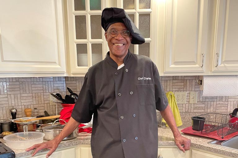 Charles wearing chef attire